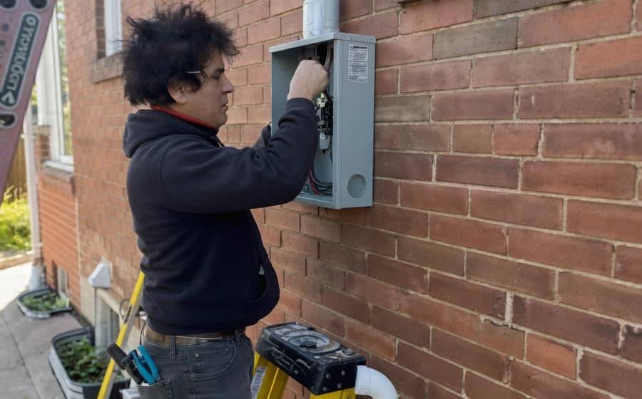 Tron Electrical licensed electrician completing a 200A electrical service upgrade in Toronto
